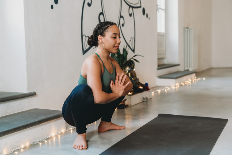 Squat and Hold Groin Stretch